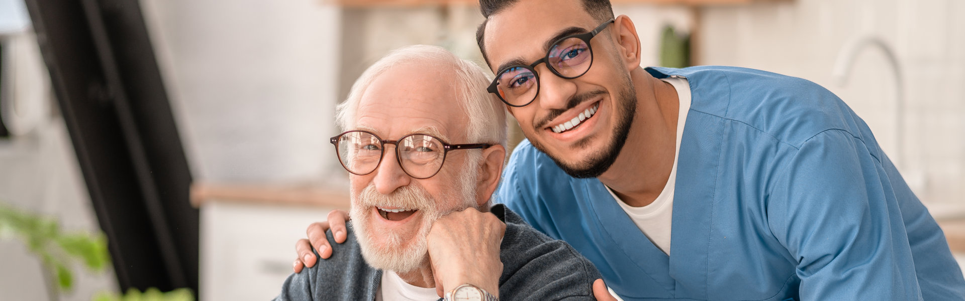 Male nurse and elderly smiling